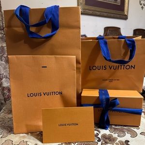 Empty Louis Vuitton paper bags and box